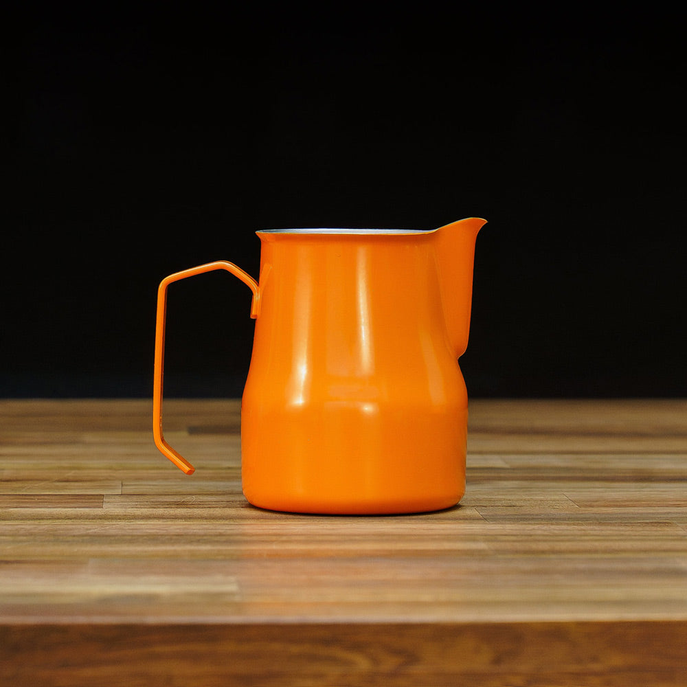 motta 350ml milk jug orange on table