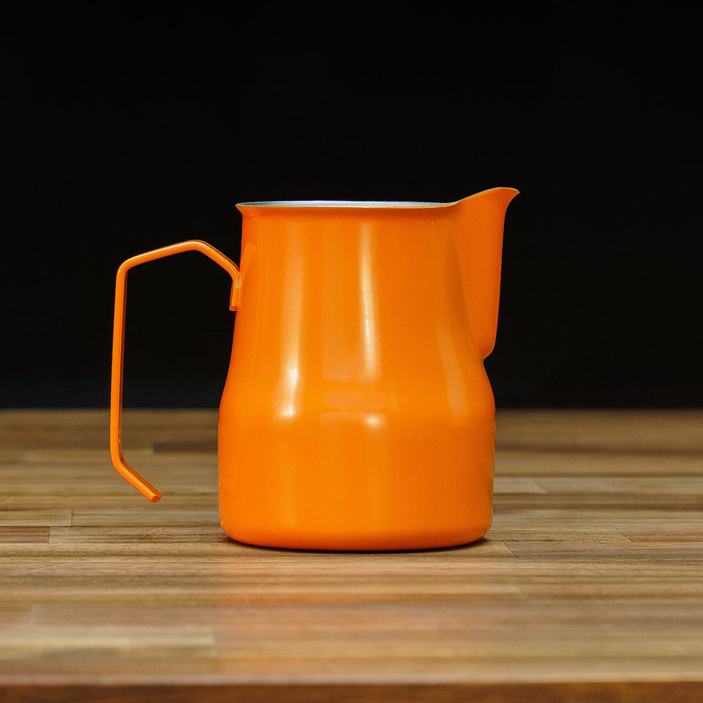 motta 500ml milk jug orange on table
