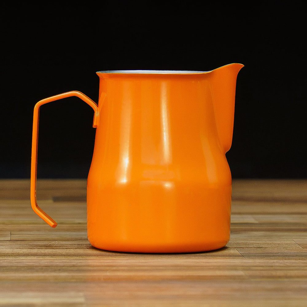 motta 750ml milk jug orange on table